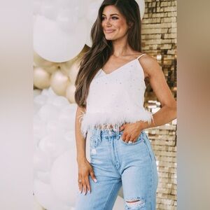 Like new, semi cropped white rhinestone tank with fur trim